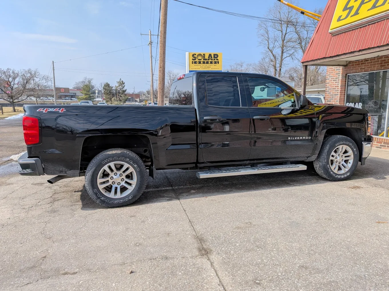 Black Chevy Silverado at the shop