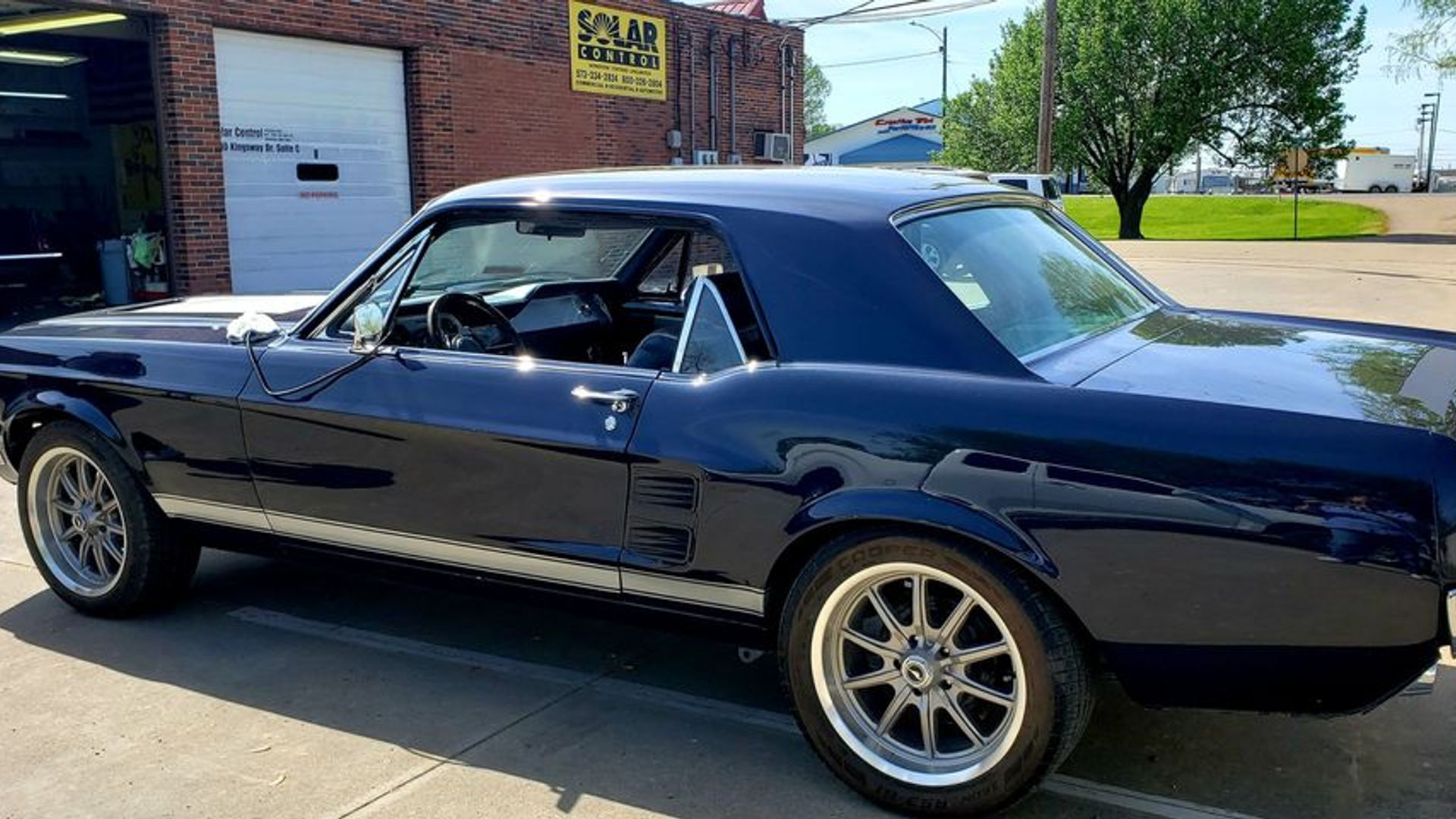 Classic blue Mustang with tinted windows at Solar Control